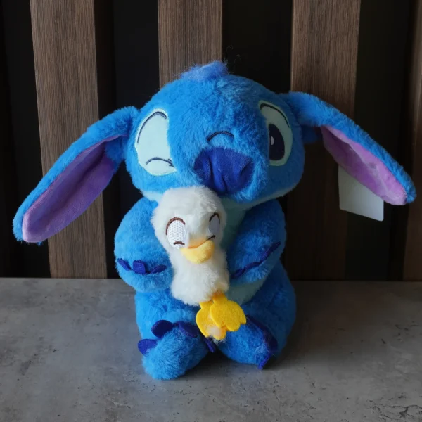 Peluche Stitch con pato